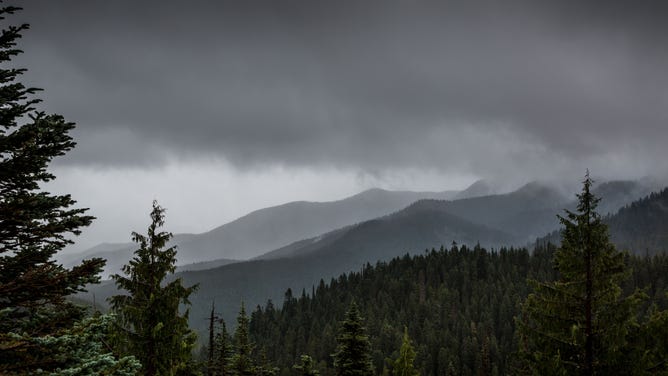 FILE - Olympic National Park's first major rain storm since June rolls across Hurricane Ridge, a popular destination overlooking the entire Olympic Mountain Range on September 17, 2021, near Port Angeles, Washington.