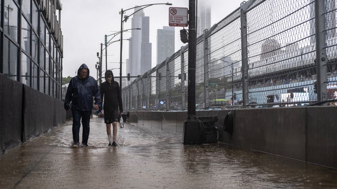 FILE - Torrential rains delayed races at the Nascar street course in Chicago, Illinois, on Sunday, July 2, 2023.