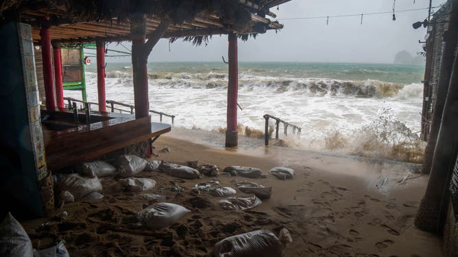 A restaurant remains closed before the arrival of hurricane Norma in Los Cabos, Baja Californa state, Mexico on October 21, 2023. Hurricane Norma is expected to slam into Mexico's northwestern coast within hours, bringing "life-threatening" winds, flooding, and a dangerous sea surge, authorities warned Saturday. The storm, still powerful though downgraded overnight from Category 3 to Category 2 on the Saffir-Simpson scale, was headed toward a part of Mexico's Baja California coast popular with tourists. (Photo by Joel Cosio / AFP) (Photo by JOEL COSIO/AFP via Getty Images)