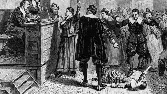 1692, A young woman accused of witchcraft in Salem Village, Massachusetts, tries to defend herself in front of Puritan ministers. (Photo by MPI/Getty Images)