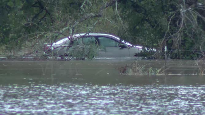 Floodwater surrounds a vehicle in Kaufman County, Texas, on Oct. 28, 2023.
