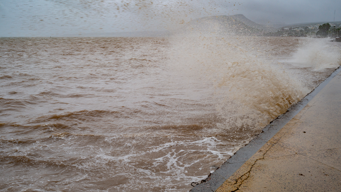 LA PAZ, MEXICO - OCTOBER 21: Strong waves crash against the sea wall on October 21, 2023 in La Paz, Mexico. Norma made landfall as a category 2 storm in the area of Los Cabos in Mexican state of Baja California Sur causing big waves and heavy rains also in Sinaloa, Nayarit and Jalisco. (Photo by Alfredo Martinez/Getty Images)