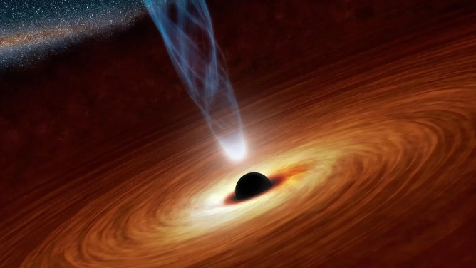 This artist concept illustrates a supermassive black hole with millions to billions times the mass of our Sun. Supermassive black holes are enormously dense objects buried at the hearts of galaxies.