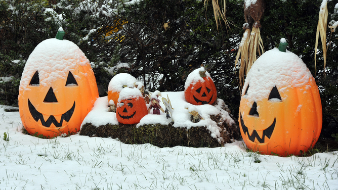 A snow covered Halloween decoration is seen in the town of Westminster, MD, October 29, 2011. An unusually cold weather hit the North East part of the United States a few days before Halloween. AFP PHOTO/ MLADEN ANTONOV (Photo credit should read MLADEN ANTONOV/AFP via Getty Images)