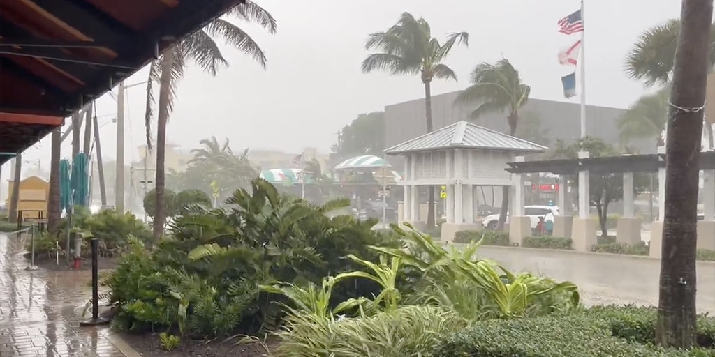 Floods and high winds hit Florida as the Atlantic watched turmoil