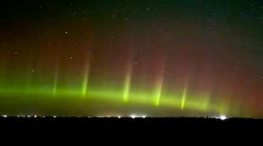 Watch Northern Lights set skies on fire above Montana, Minnesota
