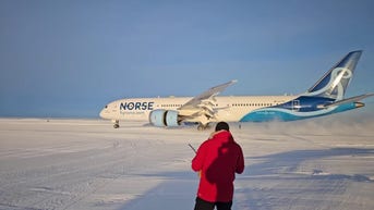 Largest passenger plane to ever land in Antarctica touches down on ice field