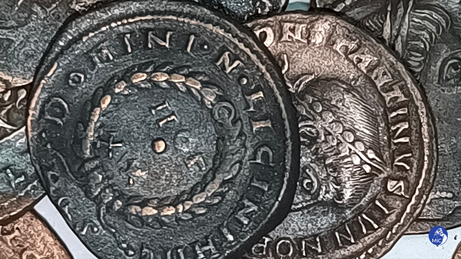 As many as 50,000 bronze coins dating back to the 4th century AD have been discovered by a diver off the coast of Sardinia, the Italian ministry of culture said.