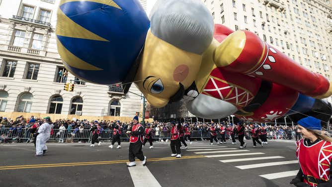 93rd Annual Macy's Thanksgiving Day Parade MANHATTAN, NY - NOVEMBER 28: Balloon handlers fight the strong wind gusts and struggle to keep Universal Orlando Resort The Nutcracker Balloon stable after it hit into some of the handlers as he makes his way down Central Park West during the 93rd Annual Macy's Thanksgiving Day Parade. The parade marched down from 77th & Central Park West south and ended at 34th Street-Macy's Herald Square was held in the Manhattan borough of New York on November 28, 2019, USA. (Photo by Ira L. Black/Corbis via Getty Images)