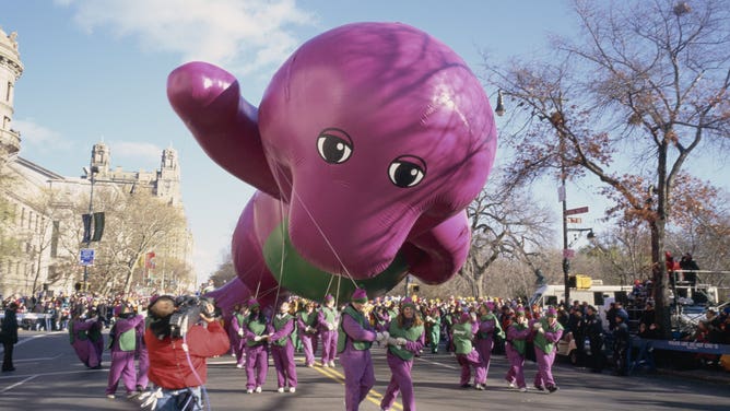 MACY'S THANKSGIVING DAY PARADE -- Pictured: The Barney balloon during the 1997 Macy's Thanksgiving Day Parade -- Photo by: NBCU Photo Bank