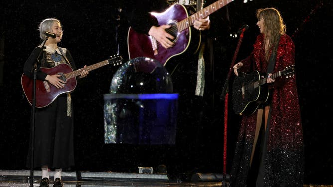 Phoebe Bridgers and Taylor Swift perform on stage on the third night of Taylor Swift |  Tour for the Ages at Nissan Stadium on May 07, 2023 in Nashville, Tennessee.