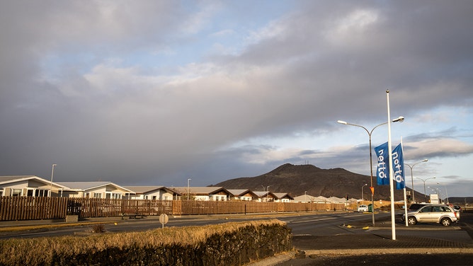 A city street of Grindavik with Thorbjöm mountain in the background. Iceland is preparing for another volcanic eruption on the Reykjanes peninsula.