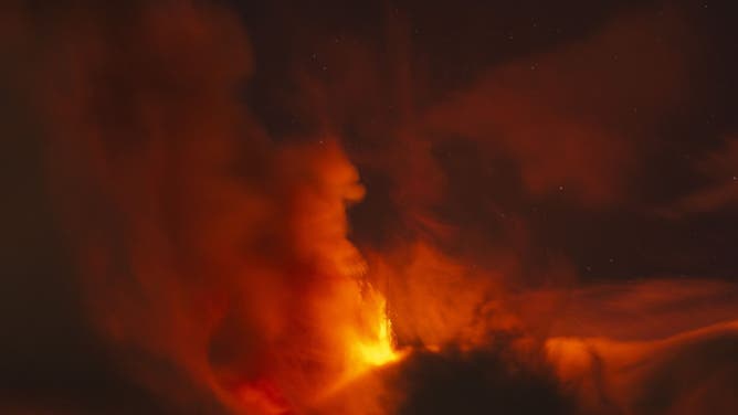 A general view of the lava erupting after Etna volcano eruption begins in the early evening of November 12 and produces a volcanic cloud in Catania, Italy on November 12, 2023.(