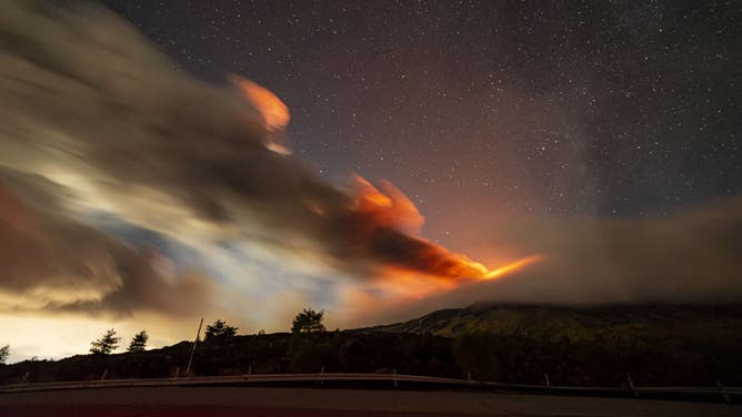 A general view of the lava erupting after Etna volcano eruption begins in the early evening of November 12 and produces a volcanic cloud in Catania, Italy on November 12, 2023