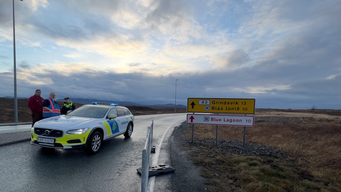 GRINDAVIK, ICELAND - NOVEMBER 12: The road to Grindavik is closed by the police on November 12, 2023 in Grindavik, Iceland. The country has declared a state of emergency after a series of earthquakes around the Fagradalsfjall volcano in recent weeks, prompting worries of a potential eruption. (Photo by Micah Garen/Getty Images)