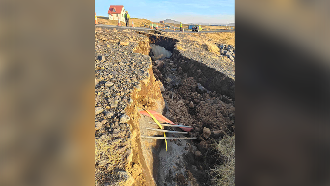 A large crack developed across a road outside Grindavik in Iceland amid fears of a volcanic eruption.
