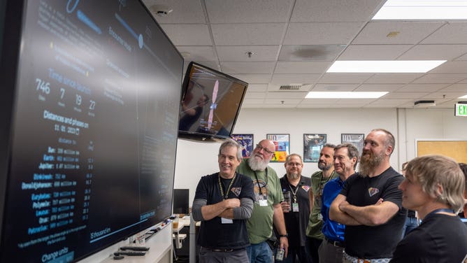 NASA's Lucy spacecraft team watches the data as Lucy flies by the asteroid Dinkinesh on Wednesday, Nov. 1, 2023. 