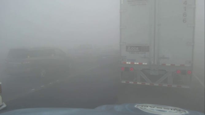 Traffic was at a standstill on I-10 outside New Orleans due to dense wildfire smoke on Tuesday, November 7, 2023.
