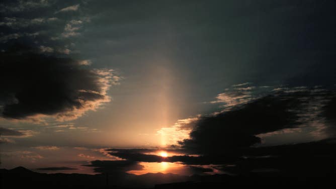 Sun pillar viewed from Asheville, North Carolina.