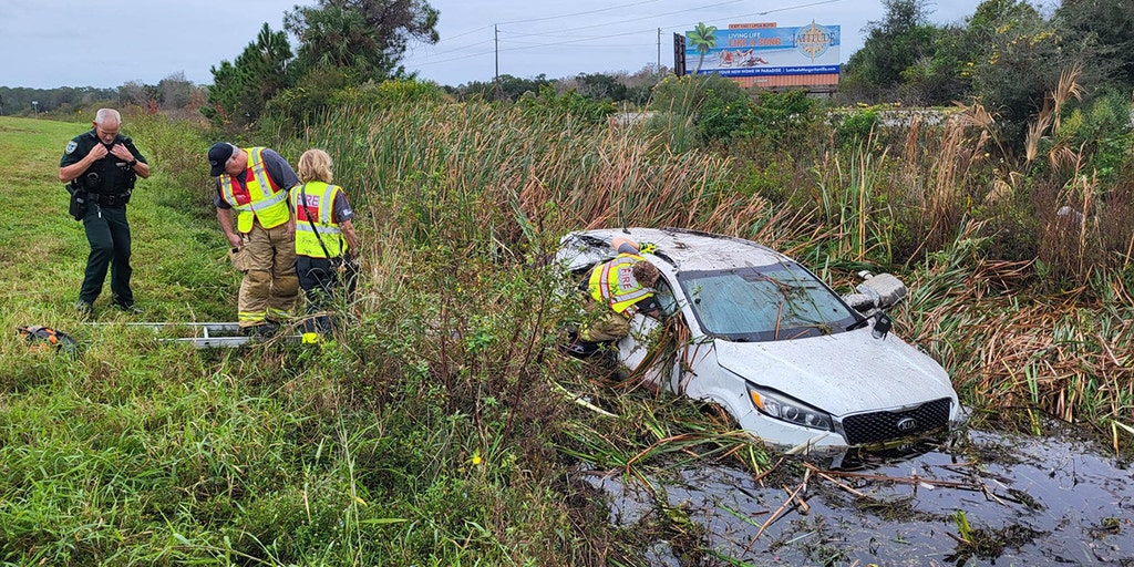 Florida Family, Christmas Gifts Rescued After Car Hydroplanes Into ...