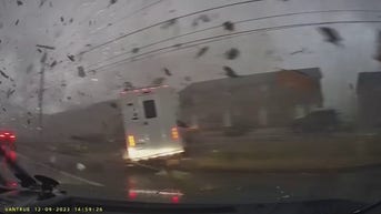 Dashcam video shows driver getting caught in Clarksville tornado