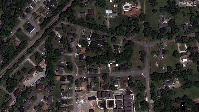 After a tornado hit Madison, Tennessee, satellite images show homes and buildings damaged or destroyed.
