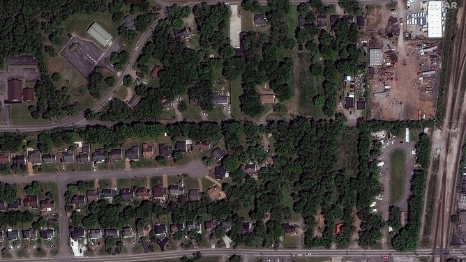 After a tornado hit Madison, Tennessee, satellite images show homes and buildings damaged or destroyed.