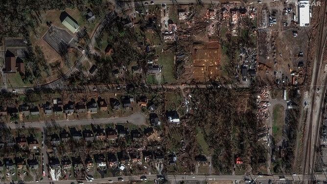 After a tornado hit Madison, Tennessee, satellite images show homes and buildings damaged or destroyed.