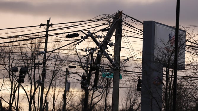 A utility pole is seen snapped in half after a deadly tornado outbreak in Tennessee on Saturday, Dec. 9, 2023.