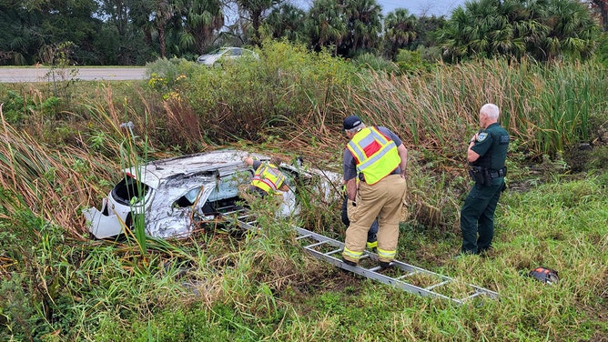 First responders saved a Florida family's Christmas after their car crashed and rolled over Monday.