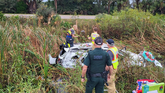First responders saved a Florida family's Christmas after their car crashed and rolled over Monday.