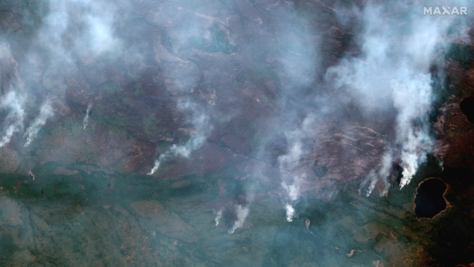 A satellite image showing wildfires near Dogface Lake in Canada.