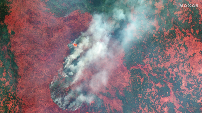 A satellite image showing wildfires near Dogface Lake in Canada.