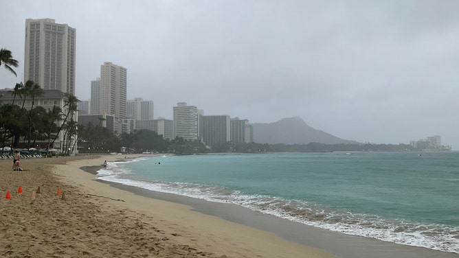 A Kona Low has trapped the Hawaiian islands under a messy, wet weather pattern, causing flooding in some parts of Waikiki on Wednesday.