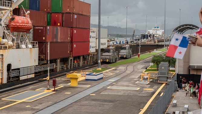 A container ship navigates through the Miraflores locks of the Panama Canal near Panama City, Panama, on Friday, Nov. 3, 2023.