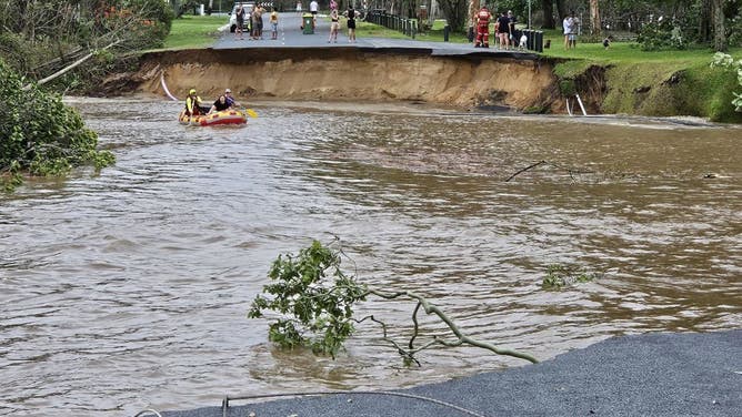 Personnel conduct search and rescue operations in the flooded area in Queensland, Australia on December 18, 2023. More than 300 rescued from floodwaters. 
