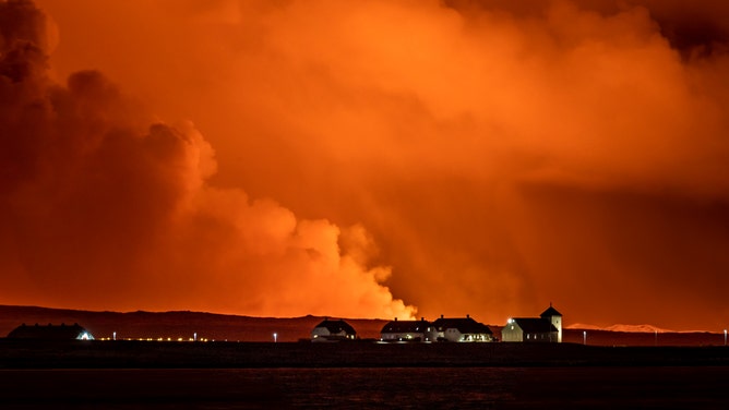 A view of the Bessastadir, the official residence of President of Iceland as volcano spews lava and smoke as it erupts in Grindavik, Iceland, December 18, 2023. (Photo by Snorri Thor/NurPhoto via Getty Images)