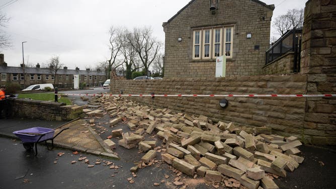 Debris from a wall damaged by a tornado is seen on December 28, 2023 in Stalybridge, England. Houses in the Tameside area of Greater Manchester have been damaged by a localised tornado during Storm Gerrit.