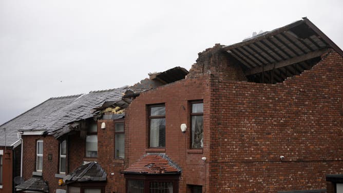 Roofs can be seen ripped off homes on Hough Hill Road following a tornado on December 28, 2023 in Stalybridge, England.