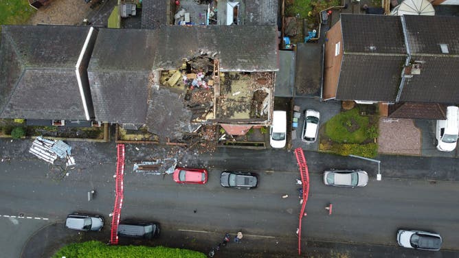 An aerial view shows a house roof blown off in the aftermath of a tornado on December 28, 2023 in Stalybridge, England. 