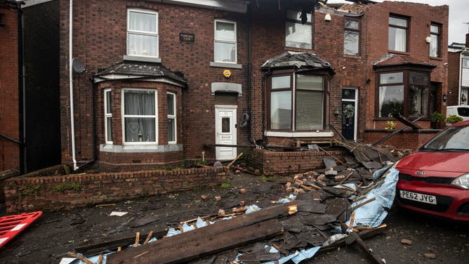 Roofs can be seen ripped off homes on Hough Hill in the aftermath of a tornado on December 28, 2023 in Stalybridge, England. 