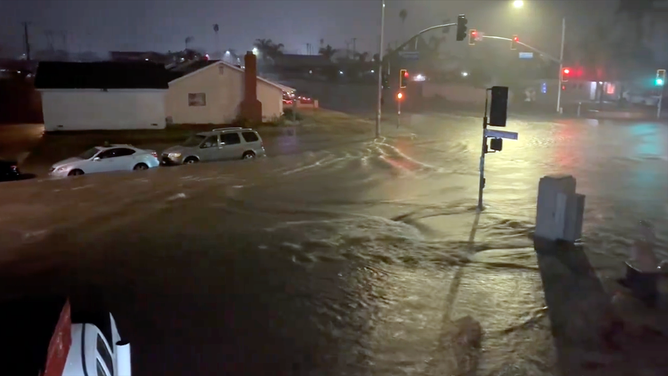 Flash flooding wreaks havoc on Los Angeles area as powerful storm slams ...