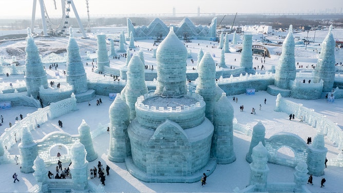 Massive ode to ice transforms into dazzling winter wonderland of color ...