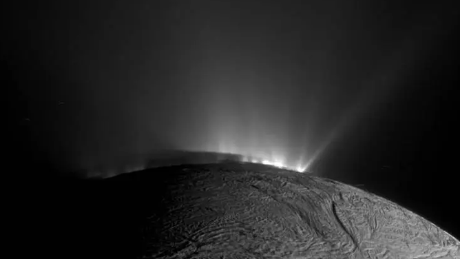 NASA’s Cassini spacecraft captured this image of Enceladus on Nov. 30, 2010. The shadow of the body of Enceladus on the lower portions of the jets is clearly visible. NASA/JPL-Caltech/Space Science Institute