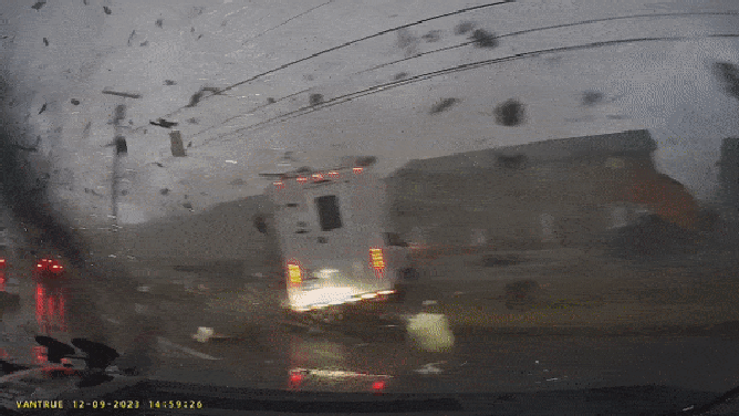 Dashcam video shows moment a vehicle crosses paths with a tornado in Clarksville, Tennessee. Dec. 9, 2023.