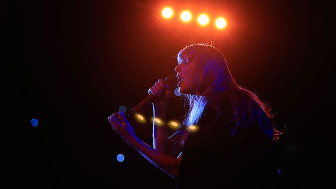 Taylor Swift performs onstage during "Taylor Swift | The Eras Tour" at Estadio Olimpico Nilton Santos on November 17, 2023 in Rio de Janeiro, Rio de Janeiro.
