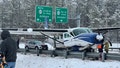Plane makes emergency landing on snowy highway outside Washington
