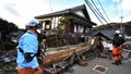 Japan earthquake death toll tops 50 as rescuers battle aftershocks to find survivors