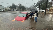 Flash flooding swamps vehicles around New Orleans as atmosphere reloads with Gulf moisture