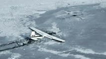 Small plane crashes into icy Utah lake